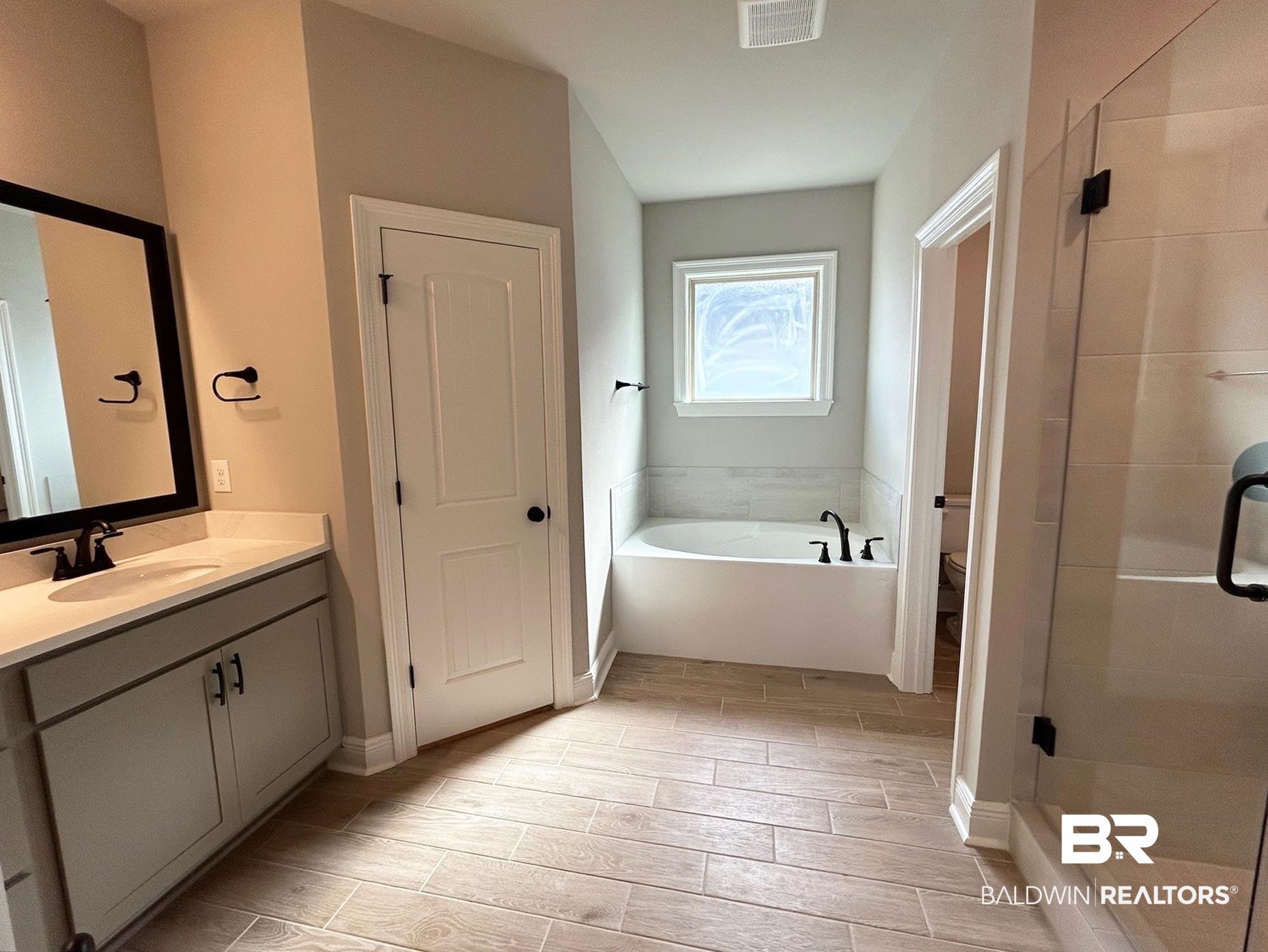 808 Sumter Loop Foley, AL 36535 - Photo 11 of 18 Full bathroom featuring vanity, separate shower and tub, and toilet