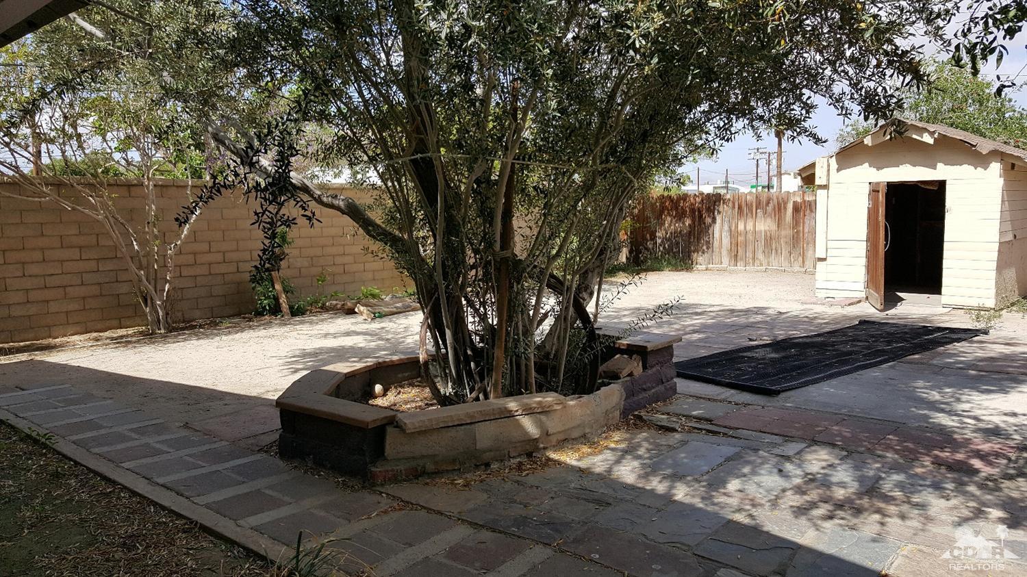 82320 Luce Court Indio, CA 92201 - Photo 11 of 11 a view of a yard with large trees