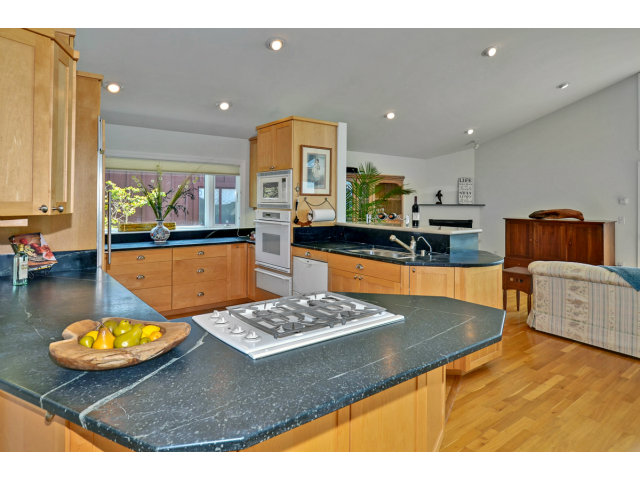 721 Seacliff Drive Aptos, CA 95003 - Photo 4 of 15 a living room with furniture and a table