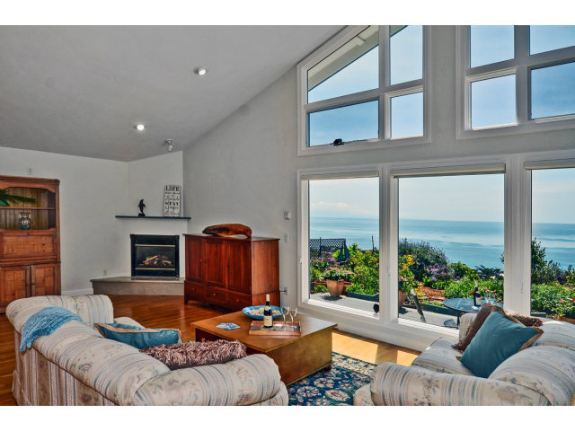 721 Seacliff Drive Aptos, CA 95003 - Photo 5 of 15 a living room with furniture and a fireplace