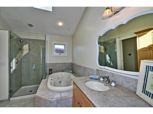 721 Seacliff Drive Aptos, CA 95003 - Photo 8 of 15 a bathroom with a sink a toilet and shower