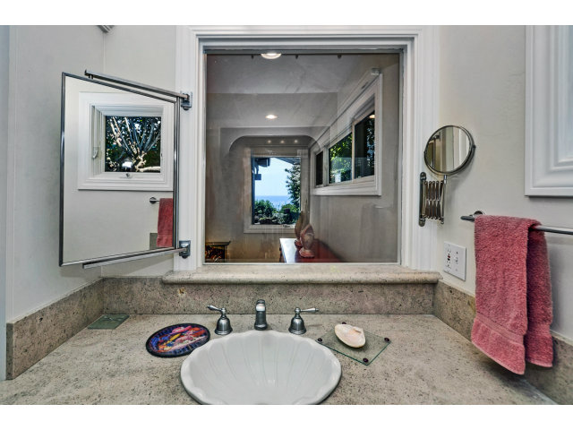 721 Seacliff Drive Aptos, CA 95003 - Photo 9 of 15 a bathroom with a sink mirror and vanity