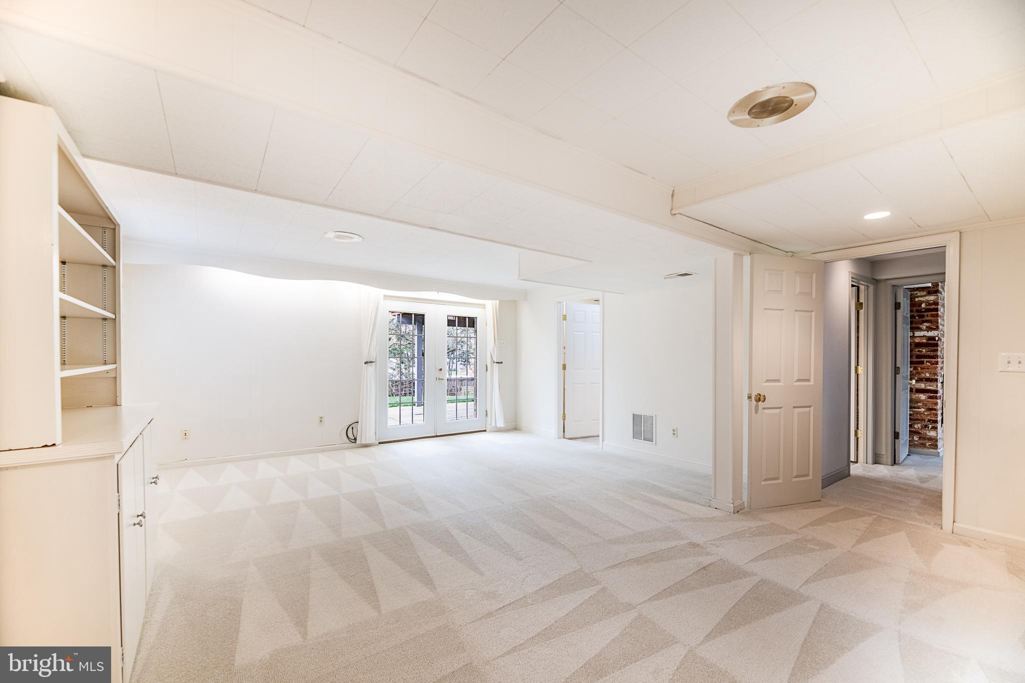 1830 Opalocka Drive McLean, VA 22101 - Photo 46 of 69 Rec room leading to patio and backyard