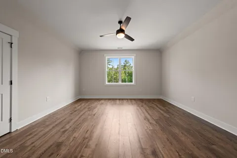 an empty room that has a window