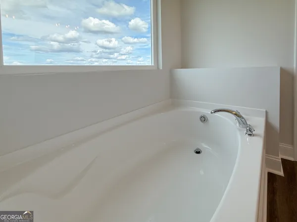 a view of a bathtub in a bathroom
