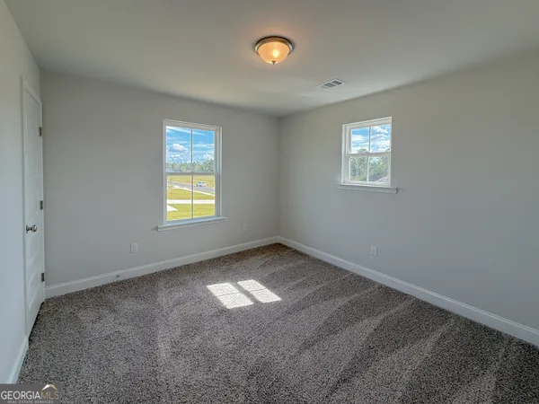 a view of empty room with window