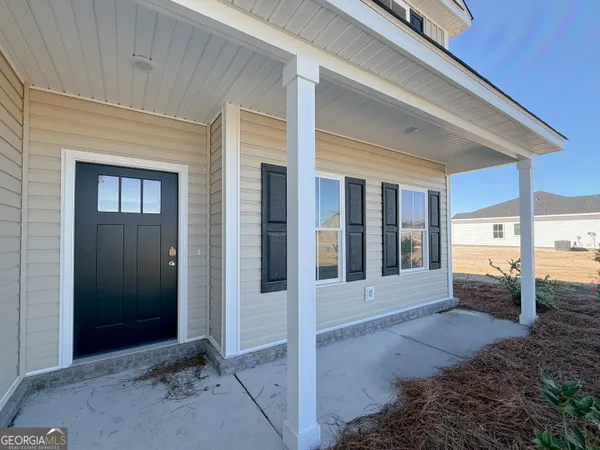 a view of a house with a porch
