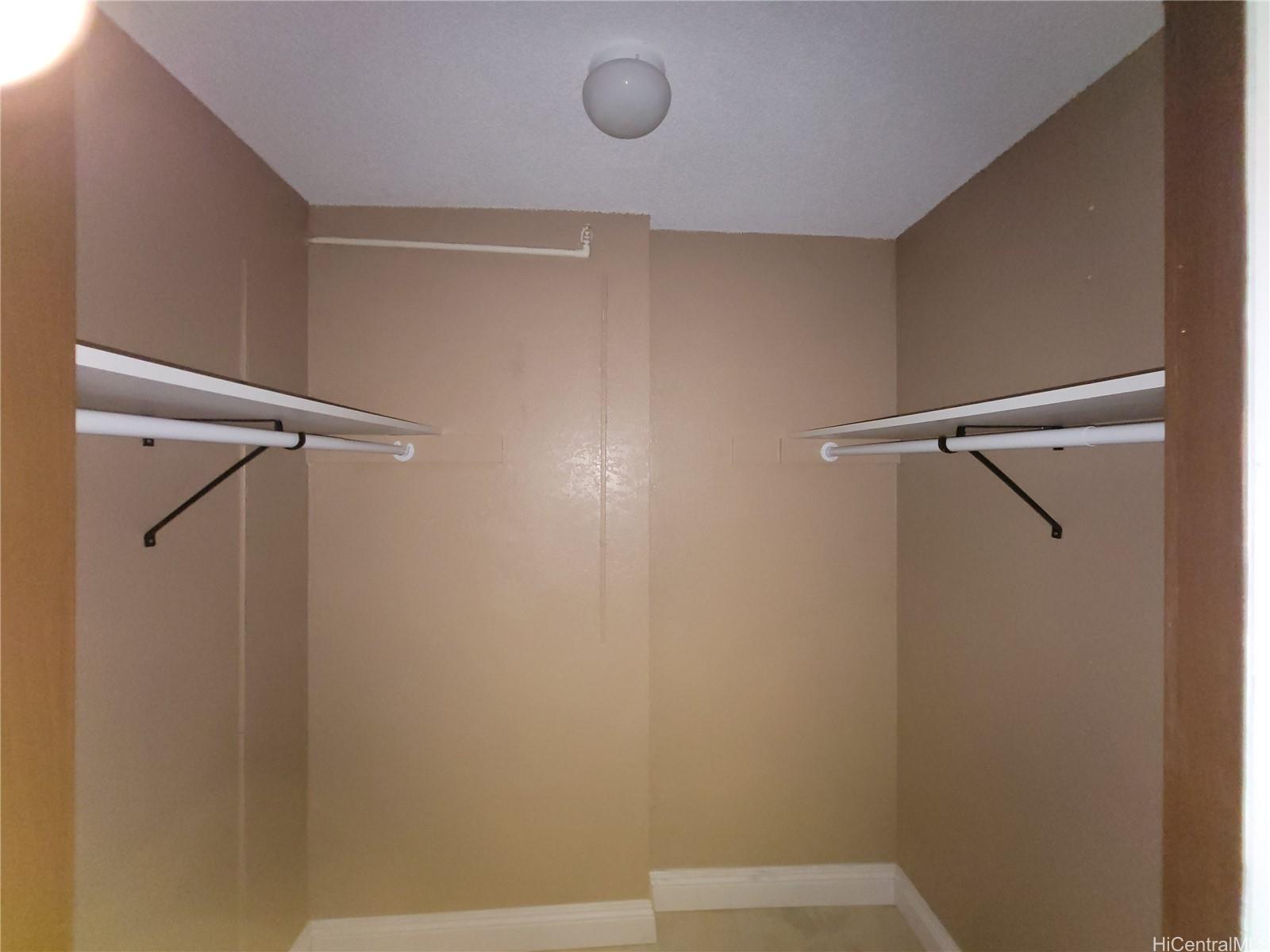 98-487 Koauka Loop, Unit B1603 Aiea, HI 96701 - Photo 15 of 20 a bathroom with a shower