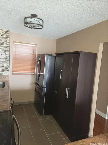 a bathroom with a shower and a sink