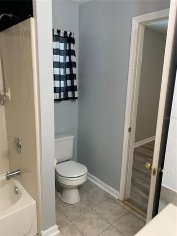 a bathroom with a bath tub