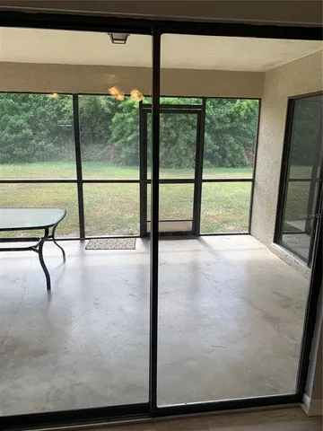 a living room with a couch and a table