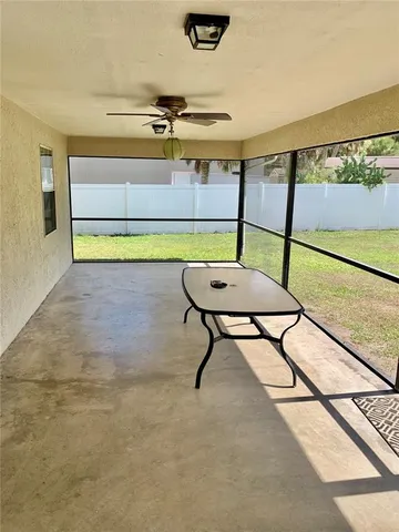 a view of a swimming pool and an outdoor space