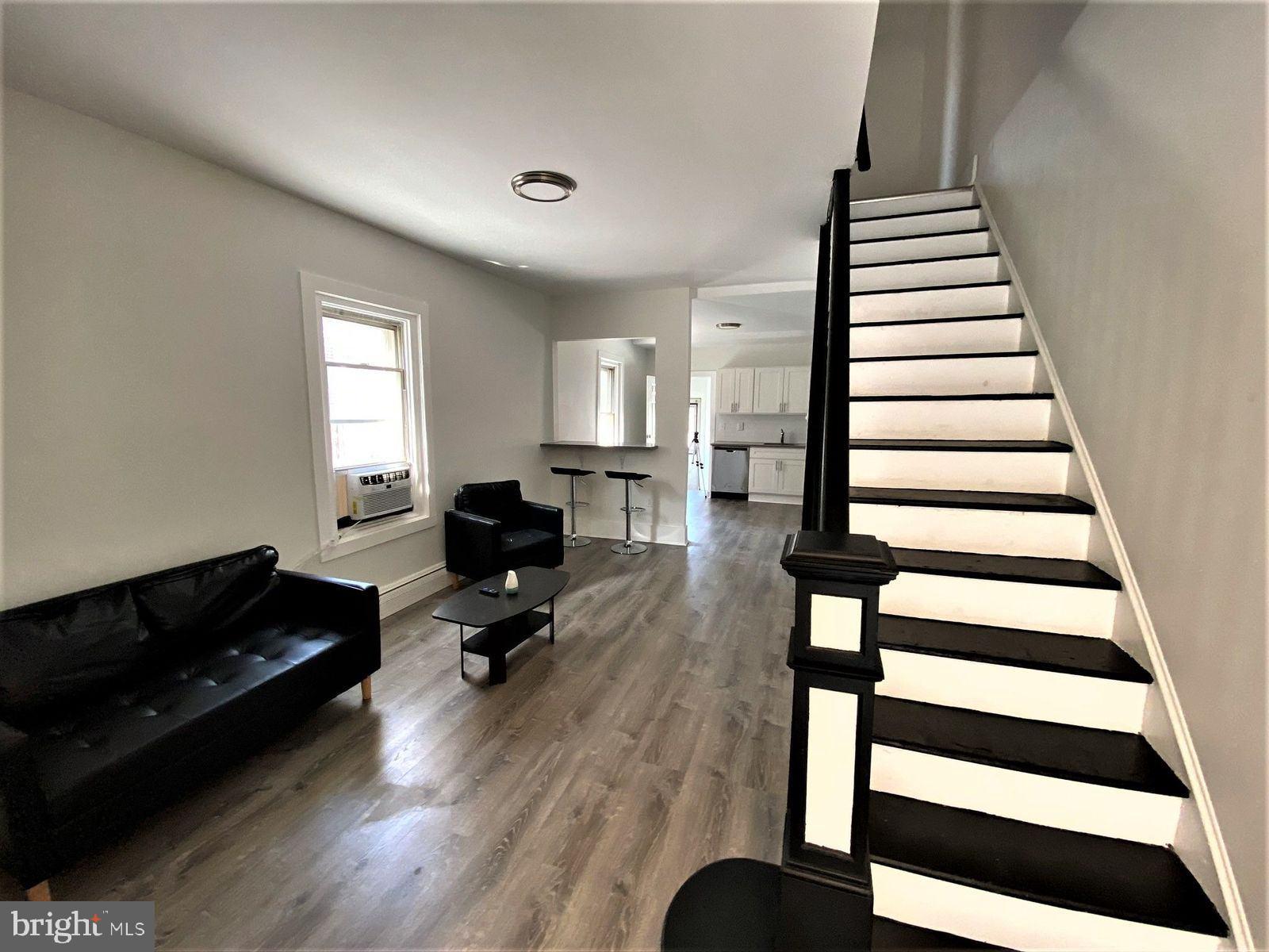 515 Thomas Street Bethlehem, PA 18015 - Photo 12 of 30 a living room with furniture and wooden floor