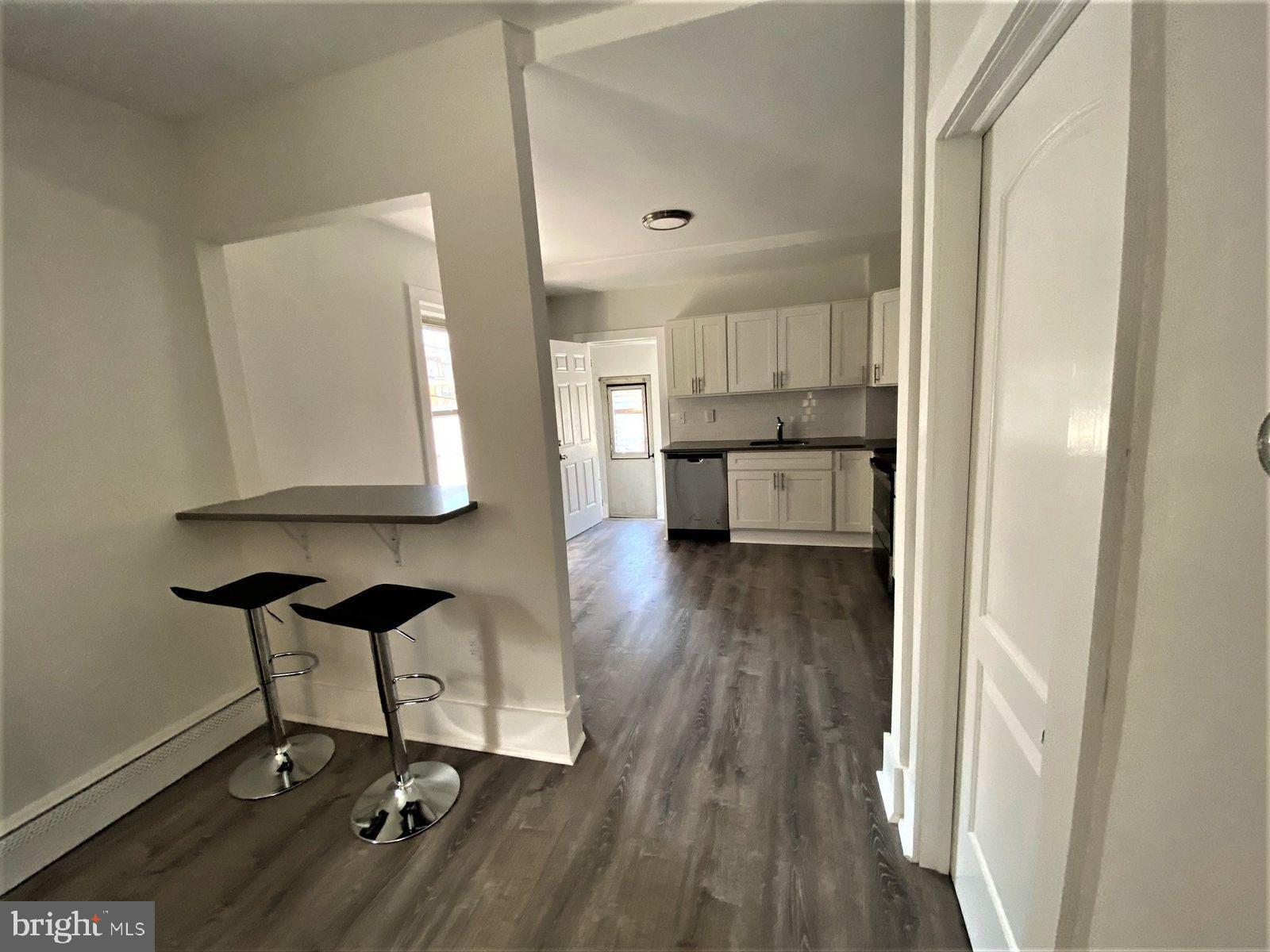 515 Thomas Street Bethlehem, PA 18015 - Photo 13 of 30 a room with furniture and wooden floor