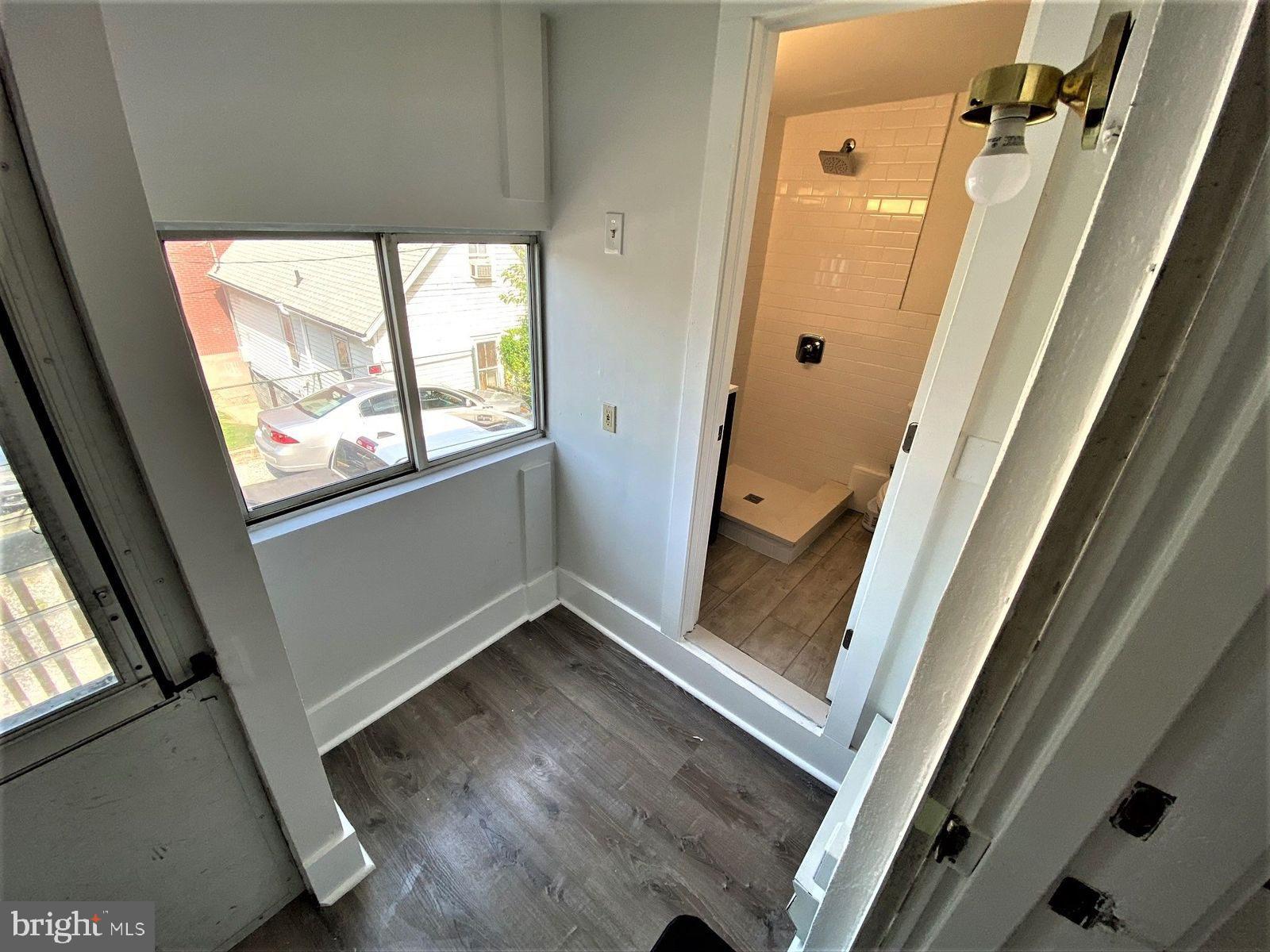 515 Thomas Street Bethlehem, PA 18015 - Photo 15 of 30 an entryway with wooden floor and windows