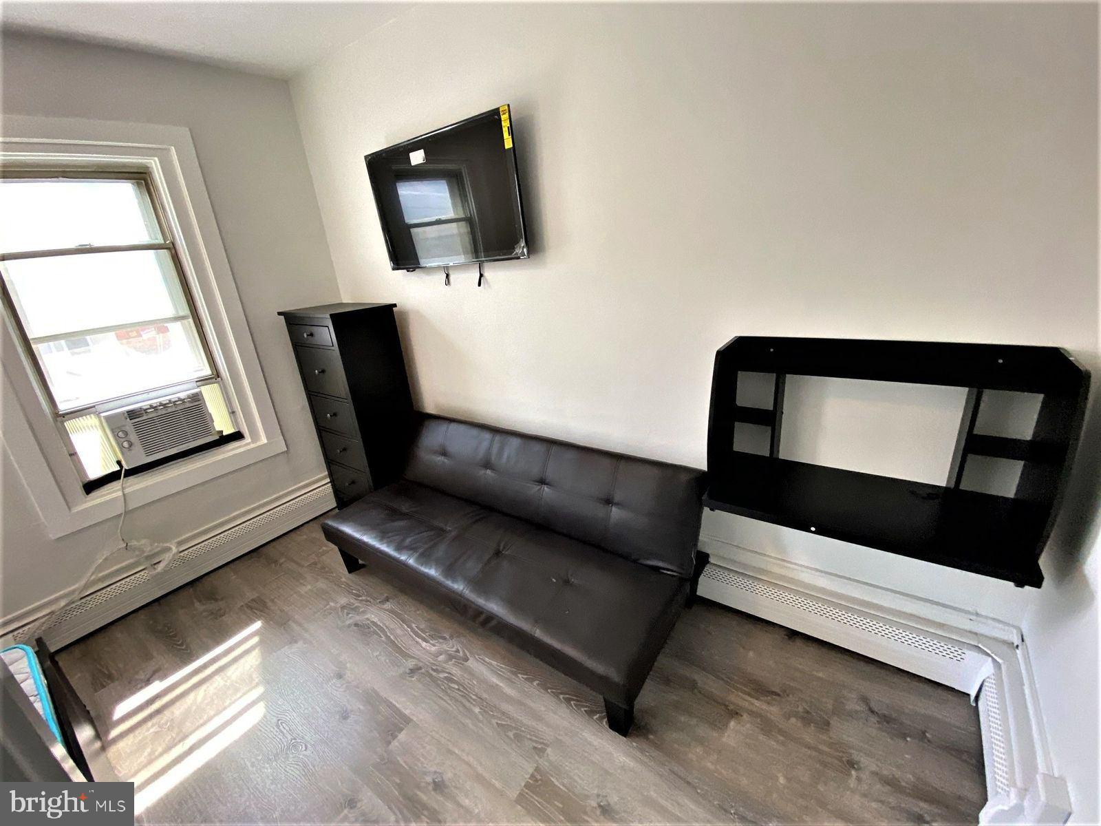515 Thomas Street Bethlehem, PA 18015 - Photo 22 of 30 a living room with furniture and a window