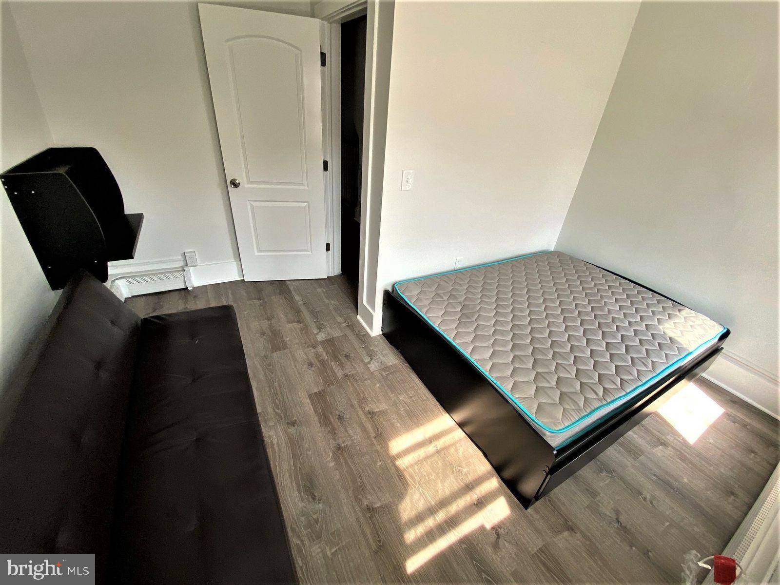 515 Thomas Street Bethlehem, PA 18015 - Photo 25 of 30 wooden floor with view of hallway