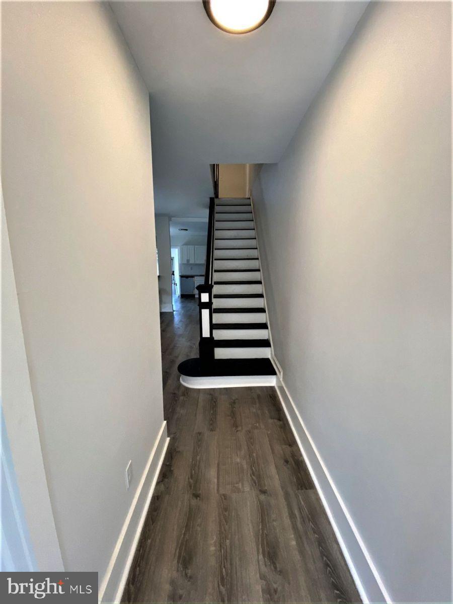 515 Thomas Street Bethlehem, PA 18015 - Photo 9 of 30 a view of a hallway with wooden floor and entryway