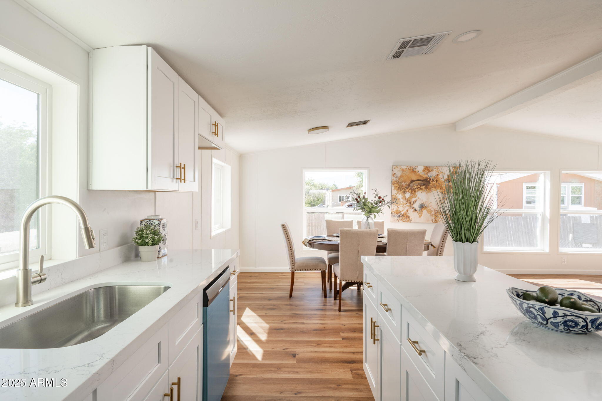 3278 East Ripple Road Camp Verde, AZ 86322 - Photo 11 of 33 a kitchen with counter top space a sink cabinets and appliances