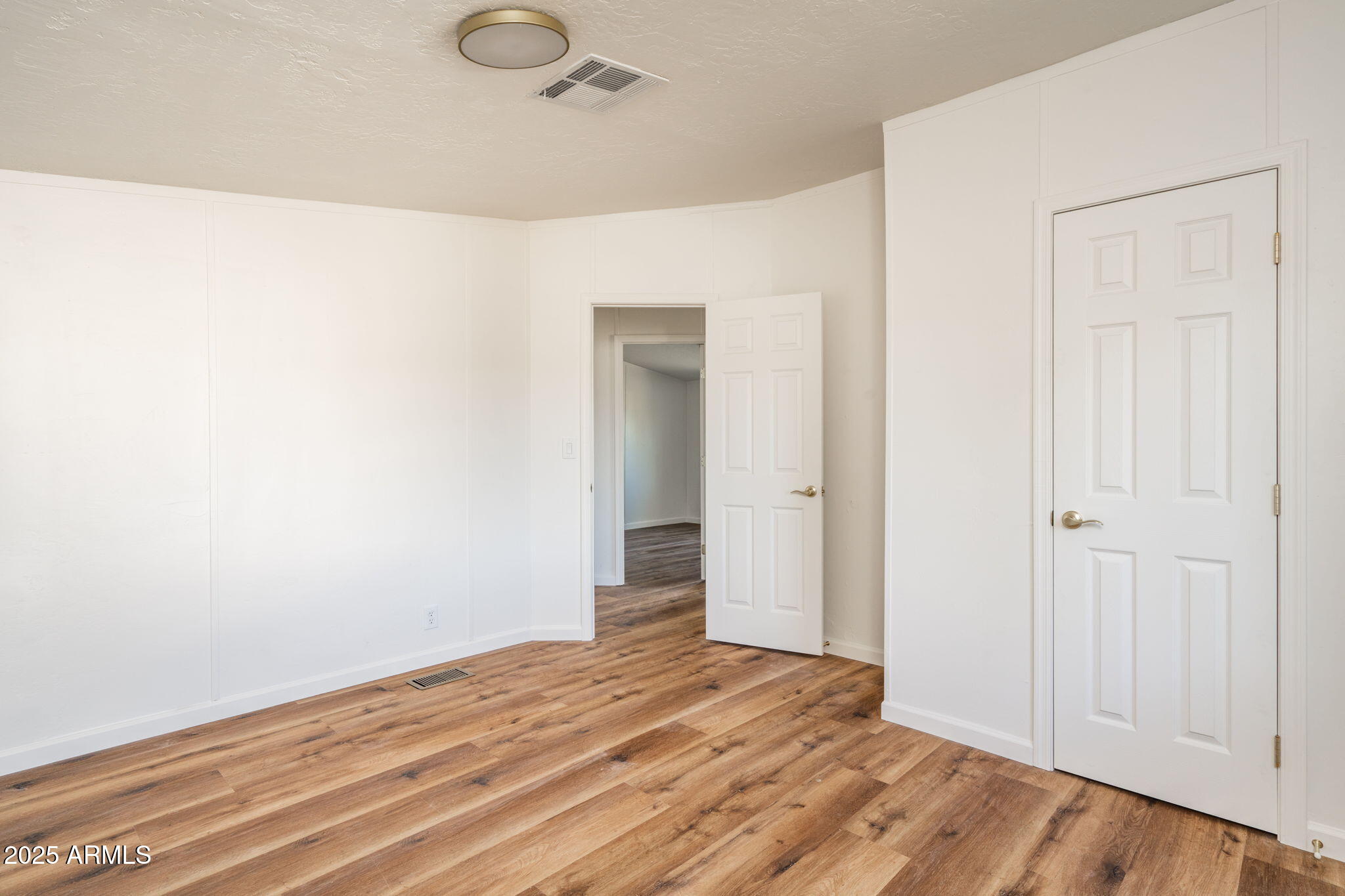 3278 East Ripple Road Camp Verde, AZ 86322 - Photo 22 of 33 a view of a room with wooden floor