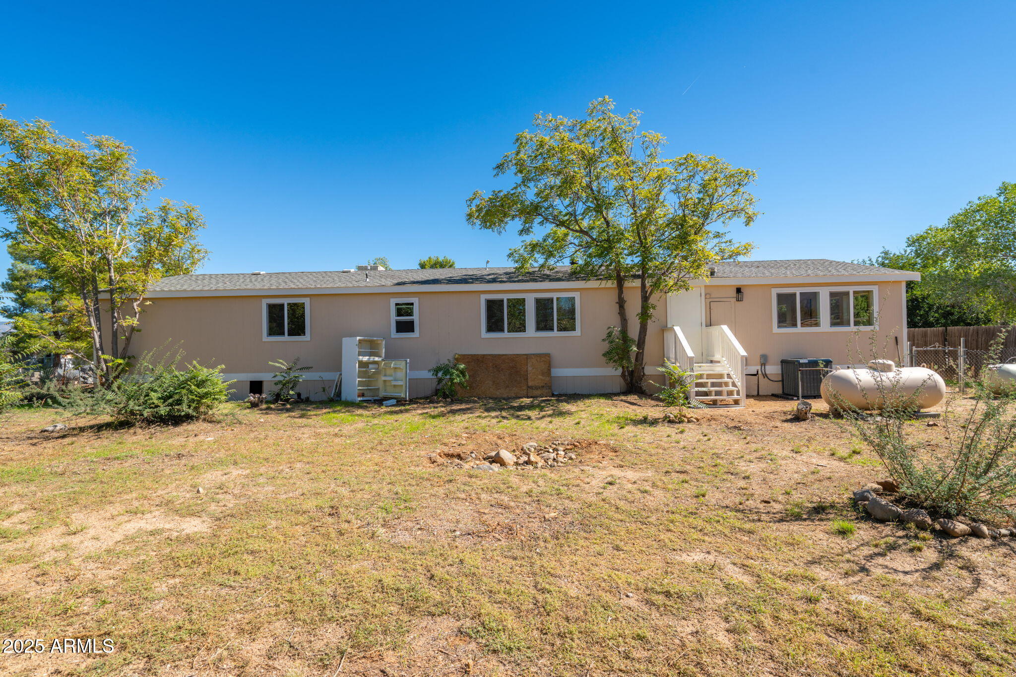 3278 East Ripple Road Camp Verde, AZ 86322 - Photo 31 of 33 a front view of a house with a patio