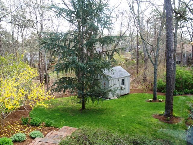 252 Training Field Road Chatham, MA 02633 - Photo 2 of 10 a view of house with a yard
