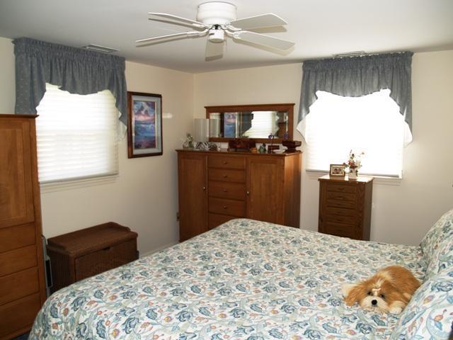 252 Training Field Road Chatham, MA 02633 - Photo 7 of 10 a bedroom with a bed dresser and a window