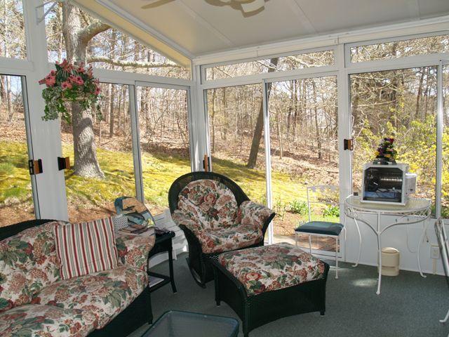252 Training Field Road Chatham, MA 02633 - Photo 8 of 10 a living room with furniture and a large window
