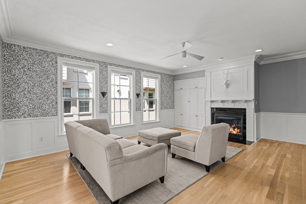 1609 Hartford Road, Unit A Austin, TX 78703 - Photo 14 of 39 Hardwood floors and a cozy fireplace define this inviting living room.