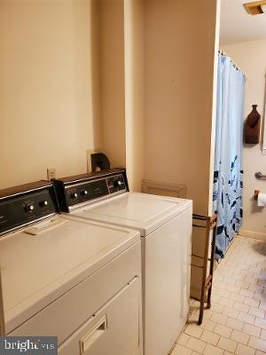 115 Club Road Pasadena, MD 21122 - Photo 16 of 22 Washer/Dryer area of Bathroom