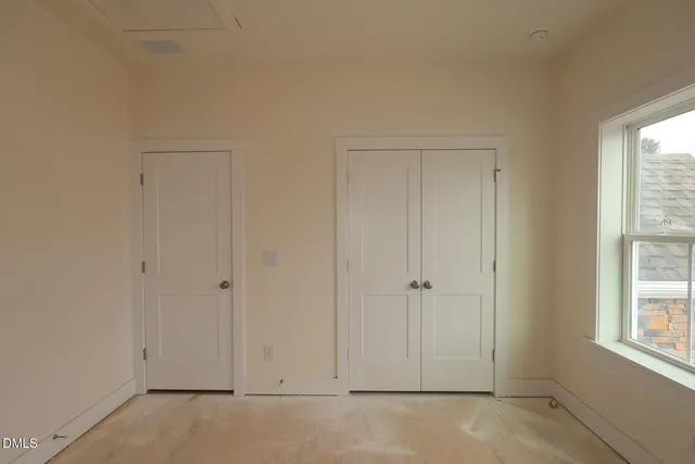 an empty room with windows