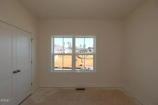 an empty room with a window