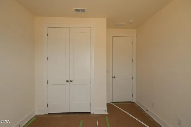 a view of room with hardwood floor