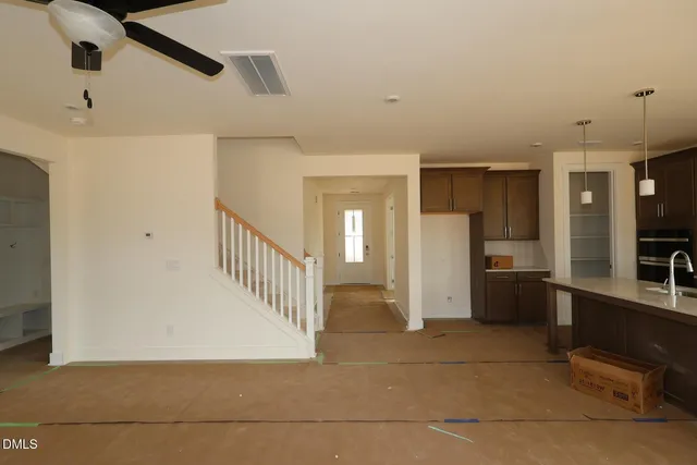 a view of a kitchen with a sink