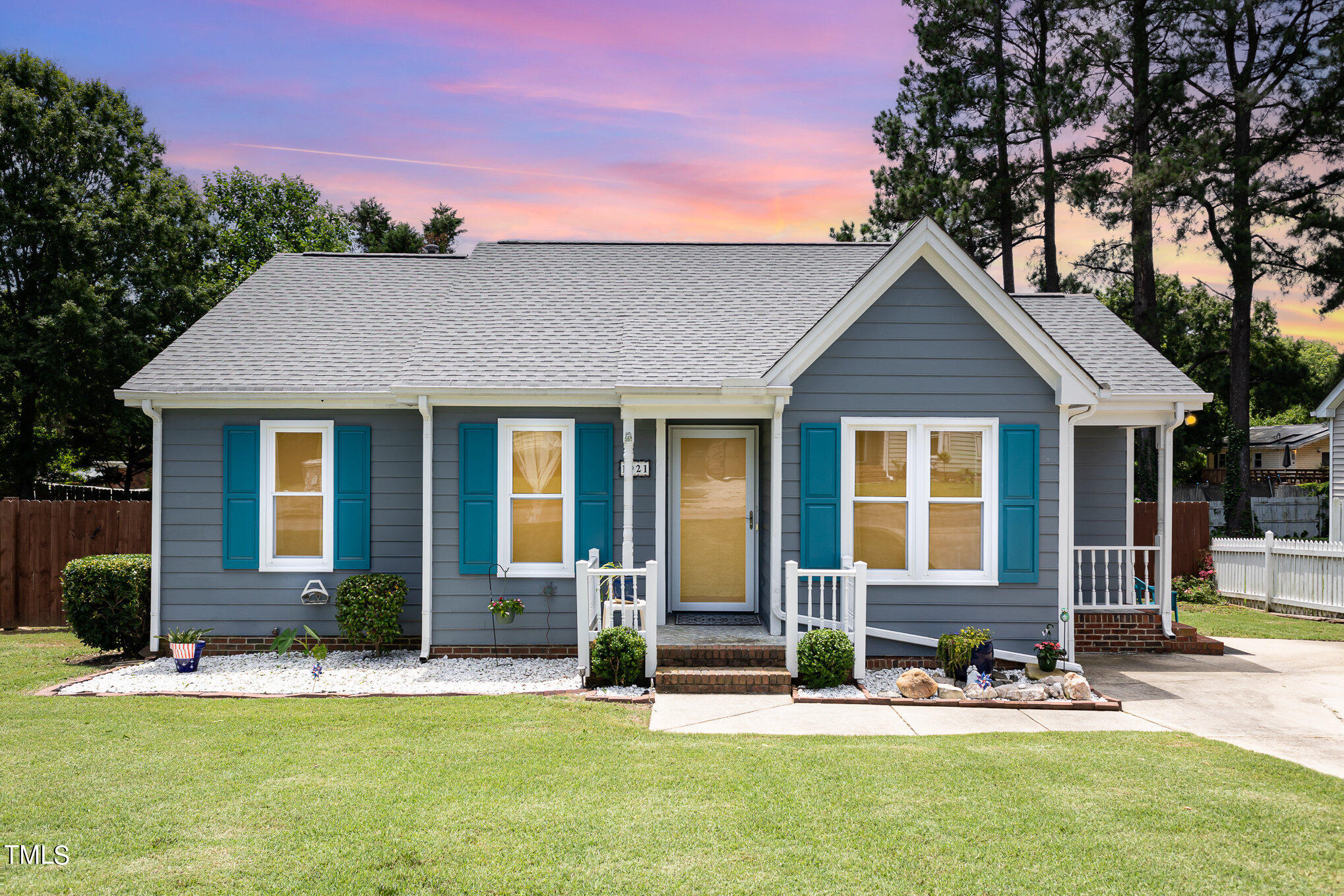 1921 Carthage Circle Raleigh, NC 27604 - Photo 1 of 19 a front view of a house with garden