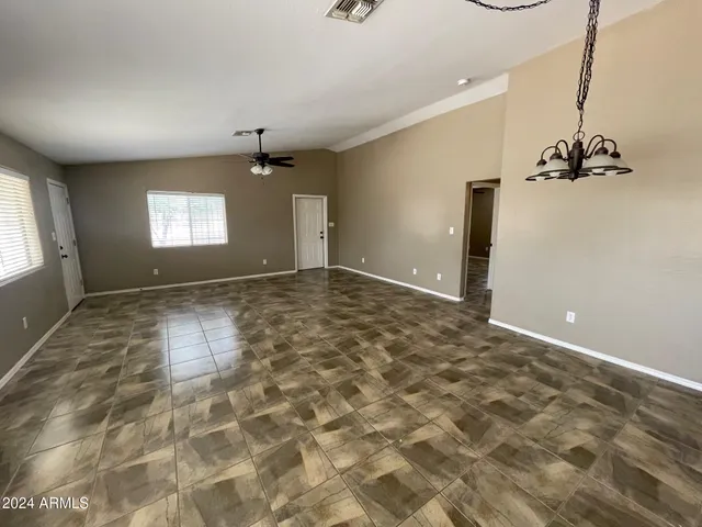 a view of an empty room and window