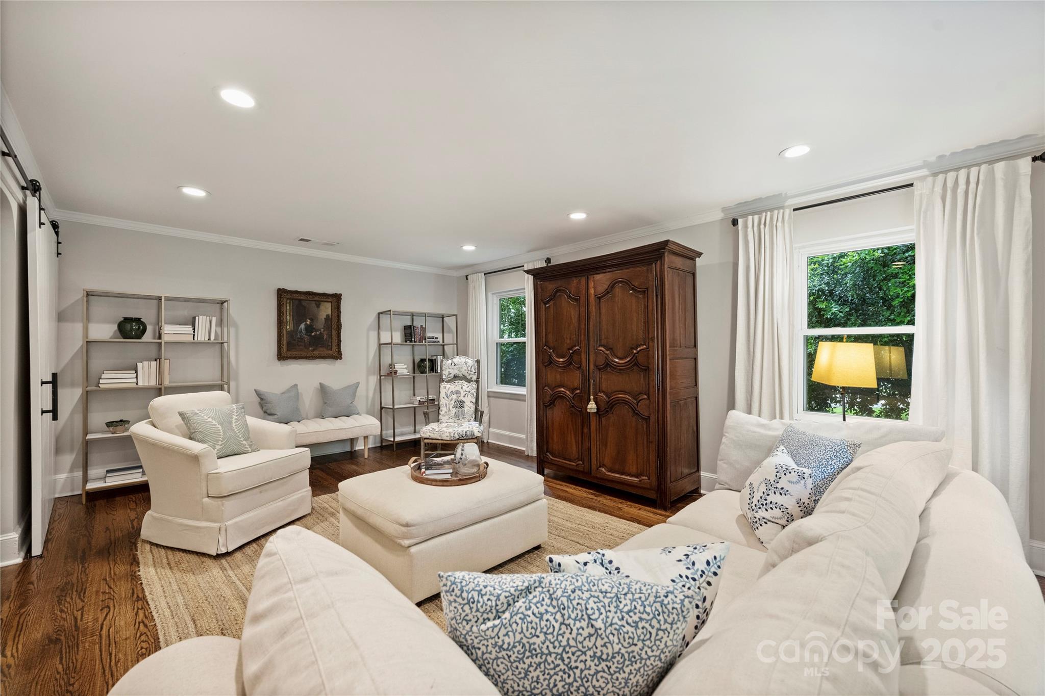 901 Scaleybark Road Charlotte, NC 28209 - Photo 6 of 34 a living room with furniture and a flat screen tv