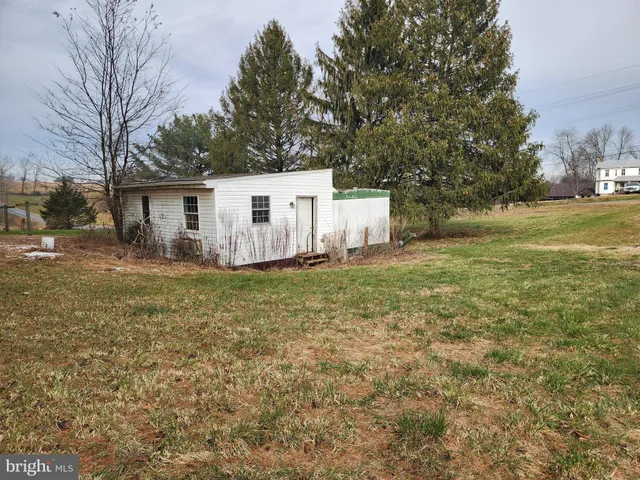 a backyard of a house with a sink