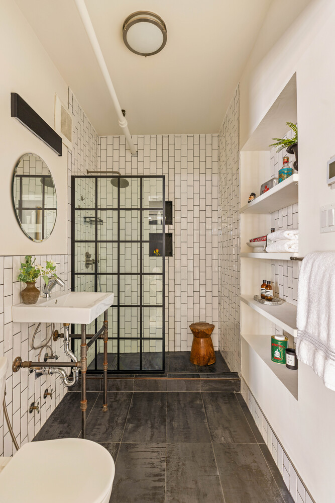 39 Pearl Street, Unit 4R Brooklyn, NY 11201 - Photo 13 of 23 a bathroom with a sink mirror and toilet