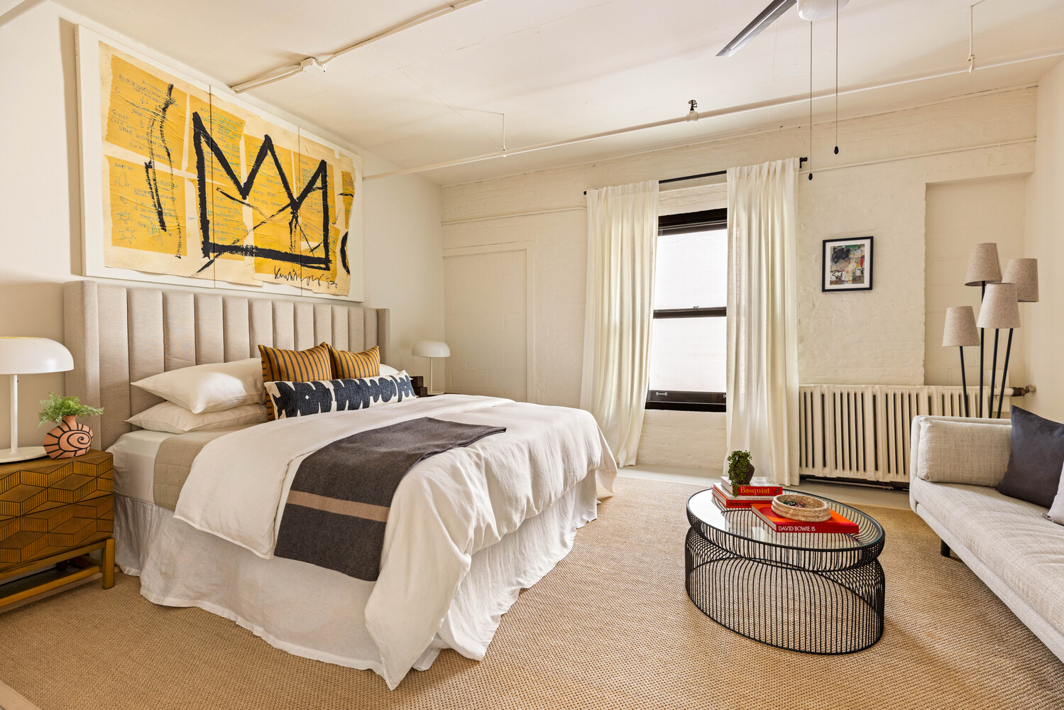 39 Pearl Street, Unit 4R Brooklyn, NY 11201 - Photo 17 of 23 a spacious bedroom with a bed and a couch