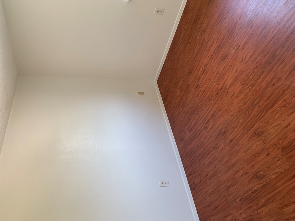 8112 Sonnet Avenue, Unit 102 Austin, TX 78759 - Photo 11 of 11 wooden floor in a room