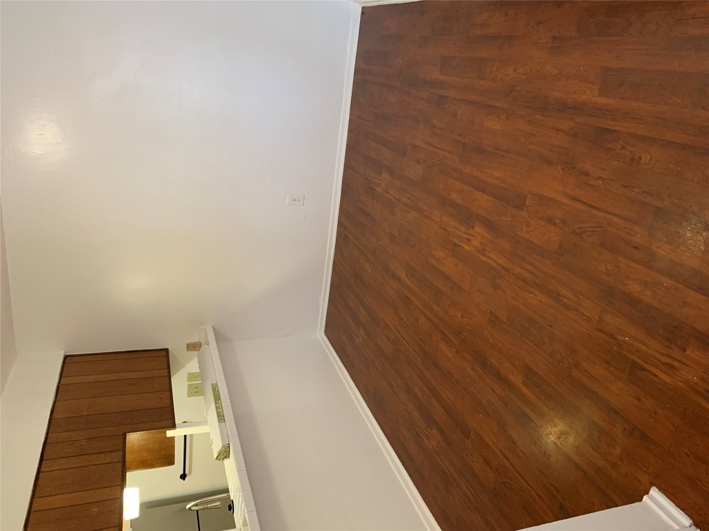 8112 Sonnet Avenue, Unit 102 Austin, TX 78759 - Photo 6 of 11 a view of a kitchen with wooden floor