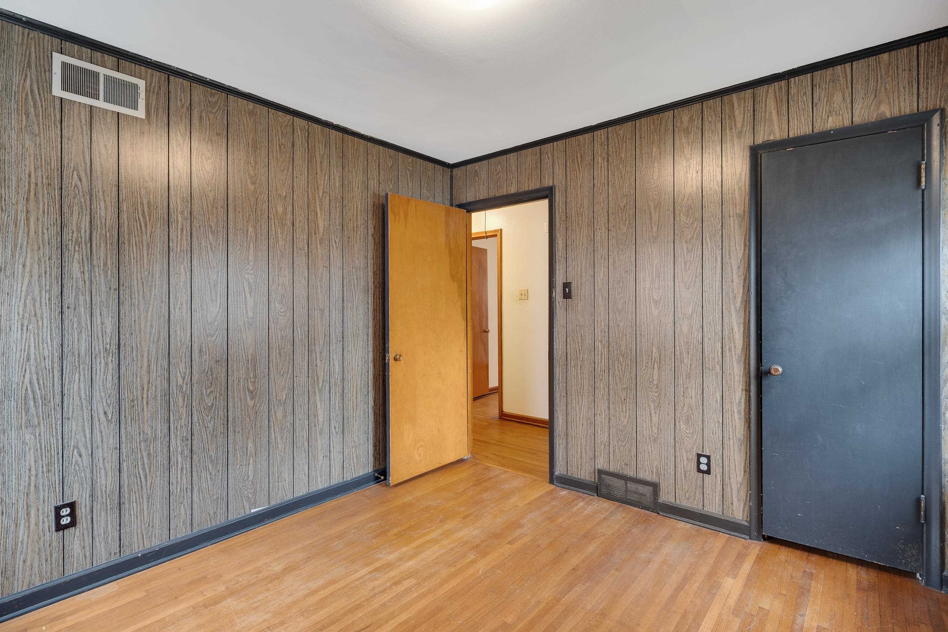4928 Flamingo Road Memphis, TN 38117 - Photo 15 of 30 a view of an empty room with wooden floor