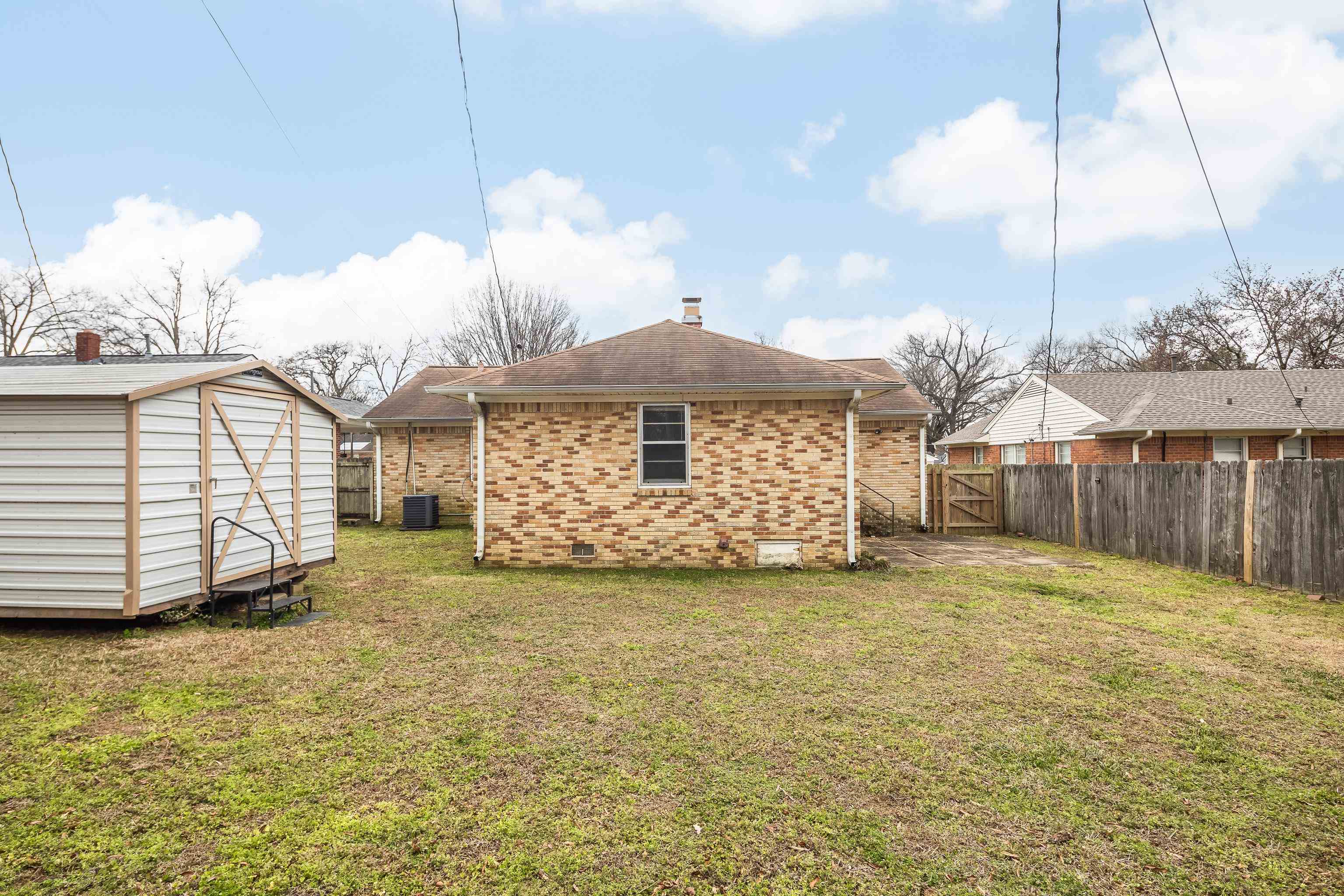 4928 Flamingo Road Memphis, TN 38117 - Photo 27 of 30 a view of a house with a yard