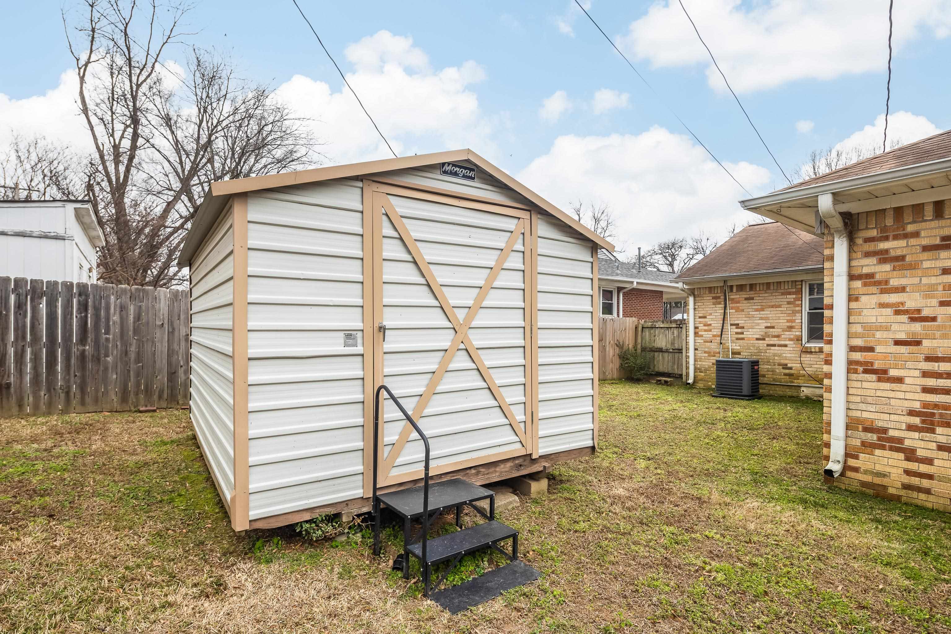 4928 Flamingo Road Memphis, TN 38117 - Photo 29 of 30 a view of a house with a yard