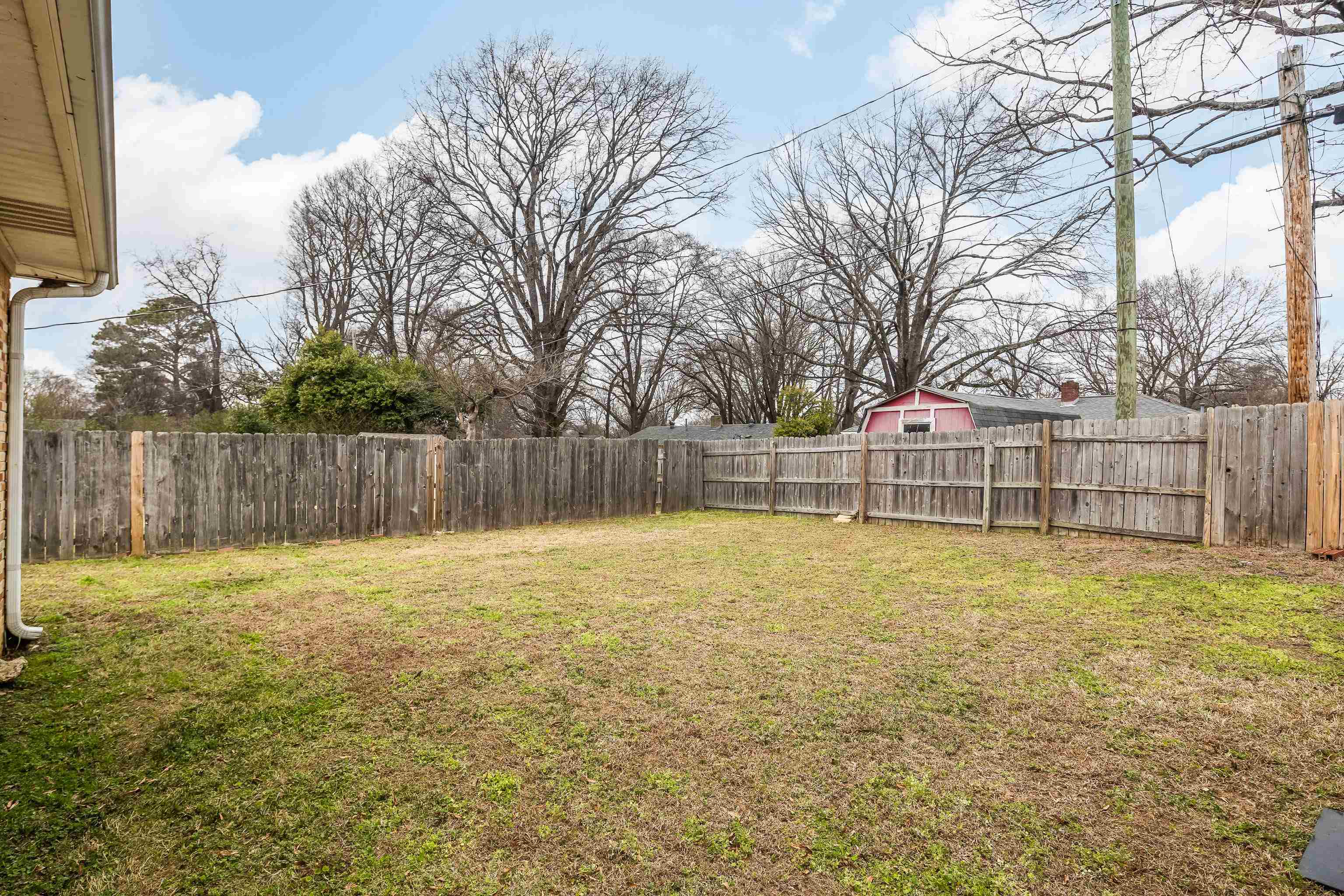 4928 Flamingo Road Memphis, TN 38117 - Photo 30 of 30 a view of a swimming pool with a big yard