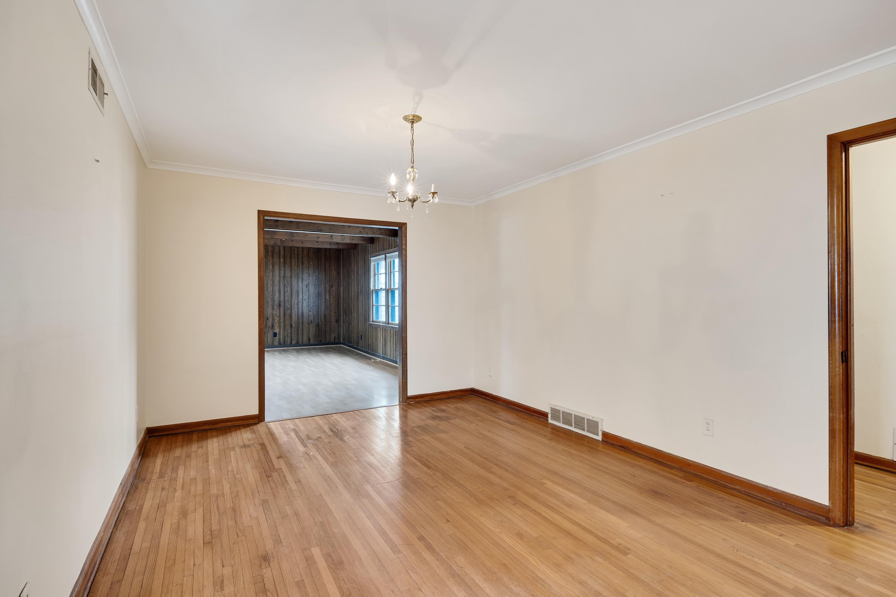 4928 Flamingo Road Memphis, TN 38117 - Photo 5 of 30 a view of an empty room with wooden floor