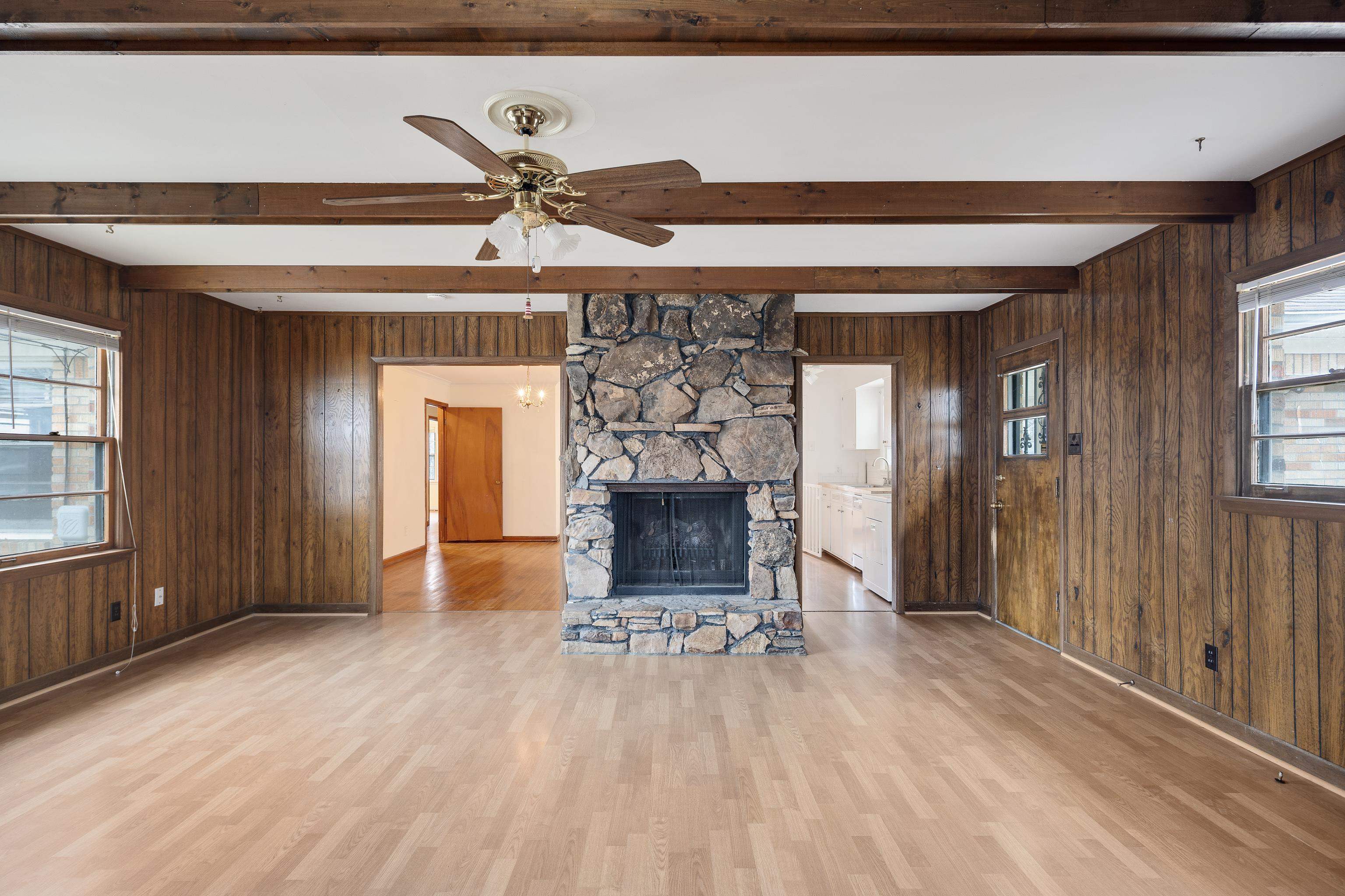 4928 Flamingo Road Memphis, TN 38117 - Photo 9 of 30 a living room with furniture and a fireplace