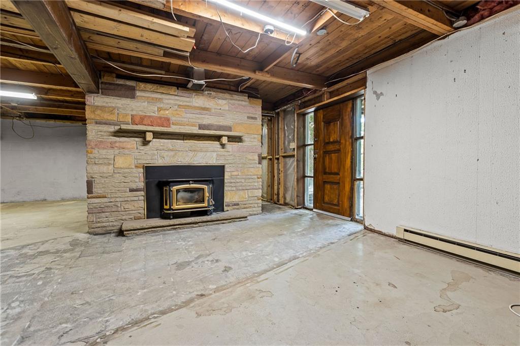 223 Greenbrier Road Acme, PA 15610 - Photo 33 of 45 LOWER LEVEL FIREPLACE