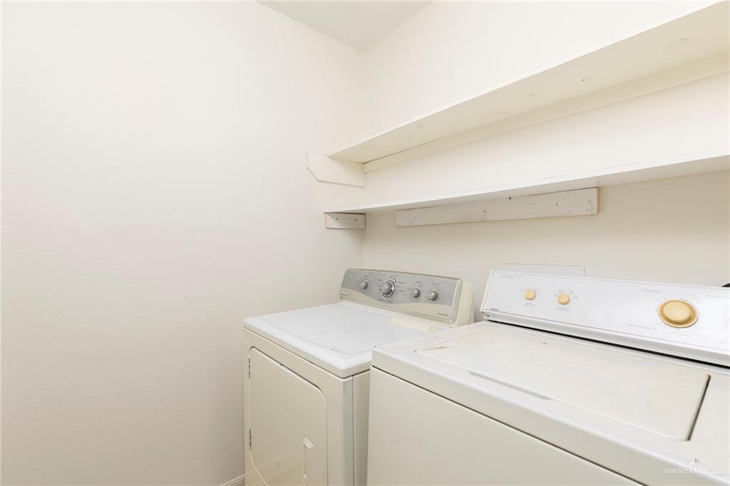 1909 Ezekiel Street Edinburg, TX 78542 - Photo 14 of 16 a utility room with dryer and washer